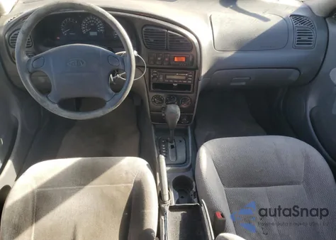 2004 Kia Spectra Base z USA, uszkodzony, nr VIN KNAFB121445318449